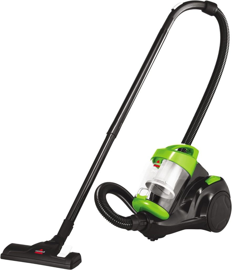 Bissell Zing Bagless Canister Vacuum with a compact and lightweight design, featuring a multi-surface floor nozzle, cyclonic technology, and an easy-to-empty dustbin, displayed in a clean home setting for effortless cleaning of carpets and hard floors.