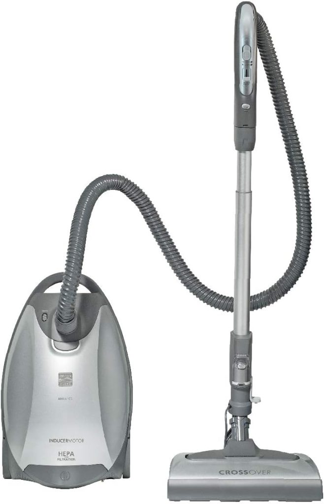 Kenmore Elite 21814 Pet-Friendly CrossOver Canister Vacuum with a stylish design, featuring a swivel head, retractable cord, and pet-specific attachments, displayed in a pet-friendly home setting for versatile cleaning on carpets, hard floors, and upholstery.