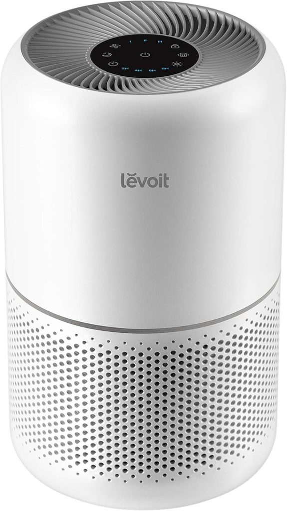 LEVOIT Air Purifier Core 300-P placed in a modern bedroom setting, effectively capturing pet hair and allergens, featuring a sleek cylindrical design with a touch control panel on top.